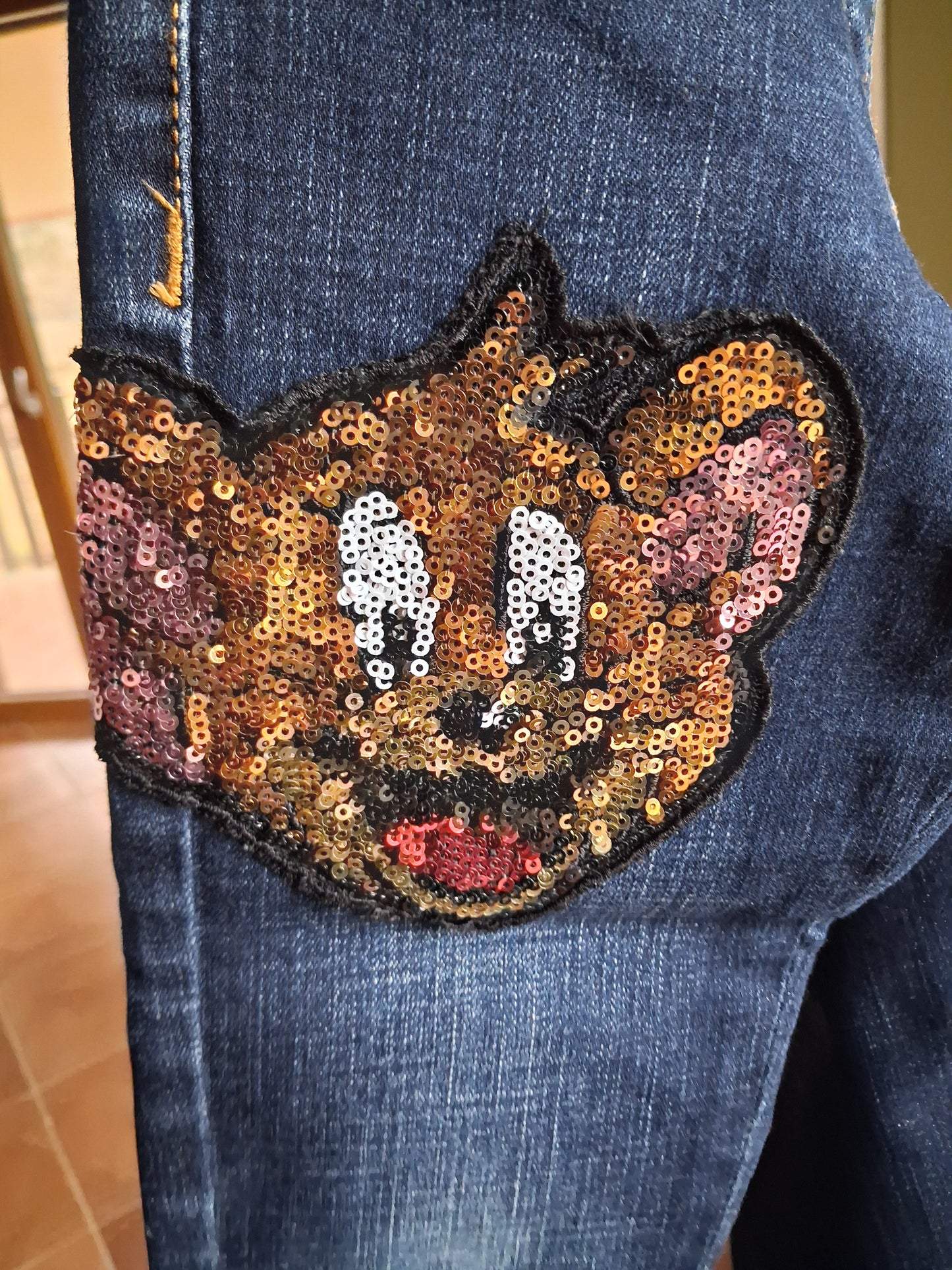 Jeans mit Sternen und Pailletten