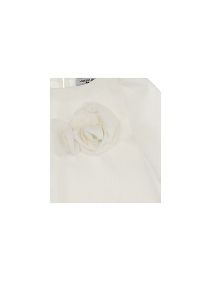 Blusa in crepe con fiore