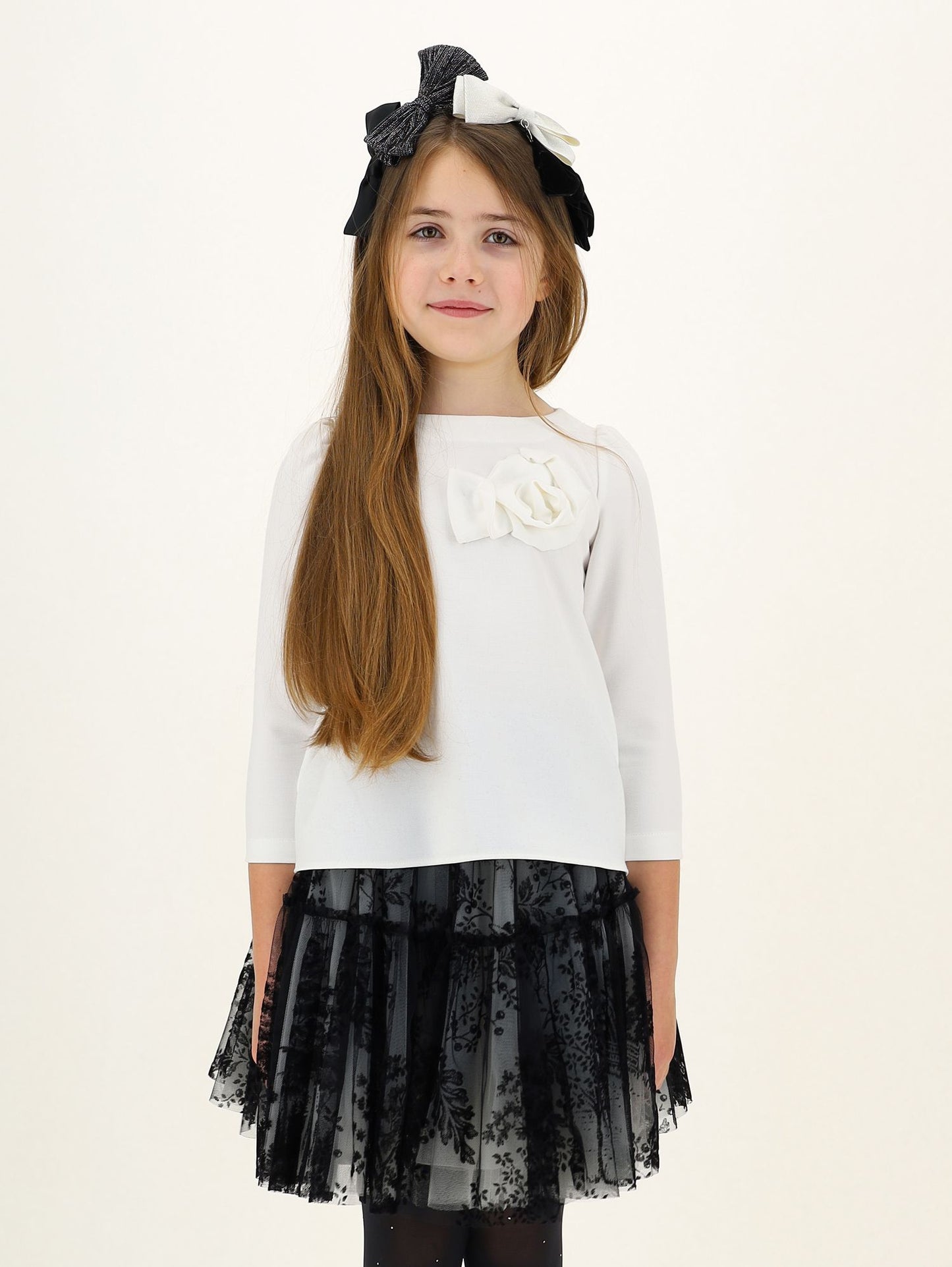 Blusa in crepe con fiore