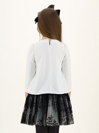 Blusa in crepe con fiore