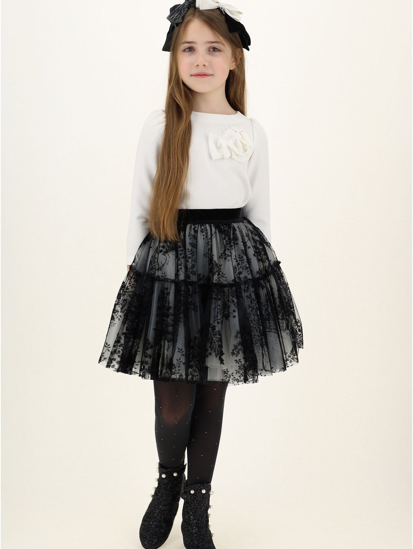 Blusa in crepe con fiore