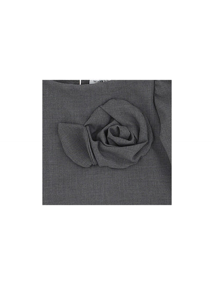 Blusa in crepe con fiore