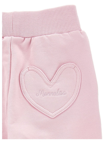 Jogger in felpa con tasca a cuore