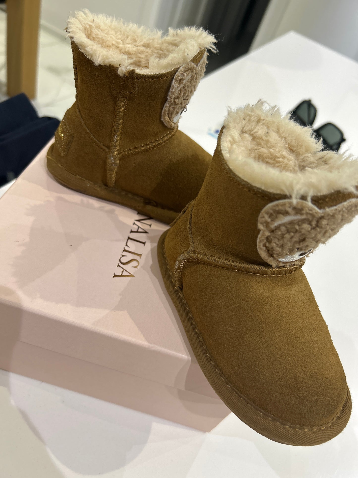 Crust boots with teddy bear