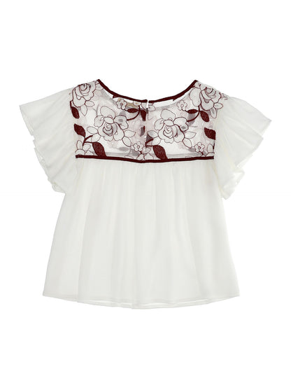 Top in crêpe con tulle e fiori